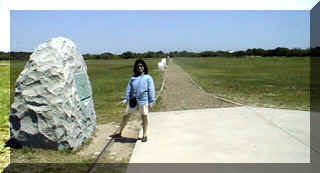 Lauren by takeoff marker with landing markers behind her